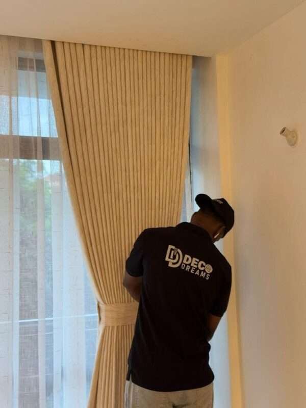 custom curtains at a Kenyan curtain manufacturing workshop.